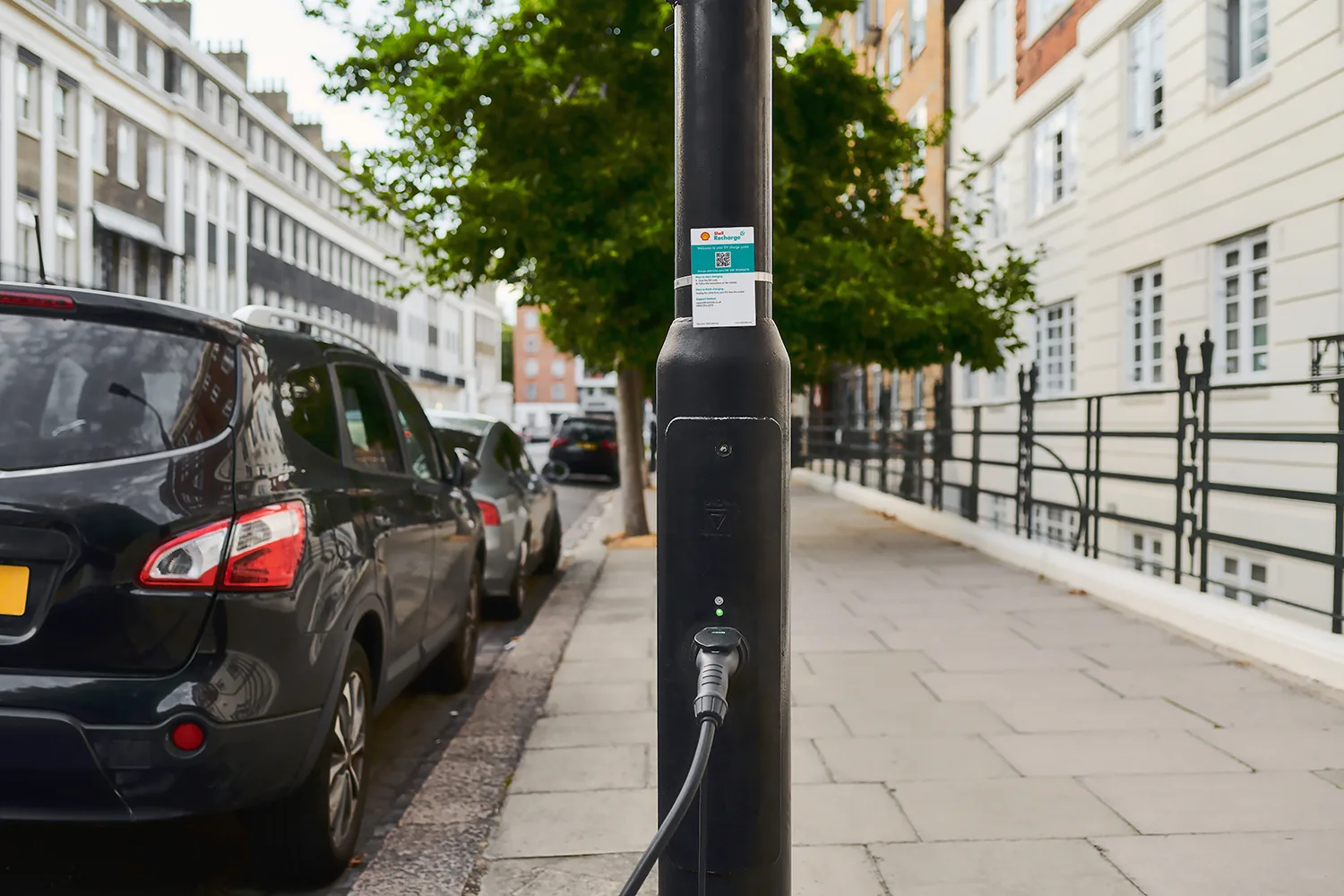 Detailed view of a Shell Recharge EV lamppost charger, operated and installed by ubitricity in partnership with local authorities and the public sector.